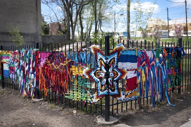 Fenceweave ephemeral public tapestry by Emily C-D, Baltimore, MD, 2013.