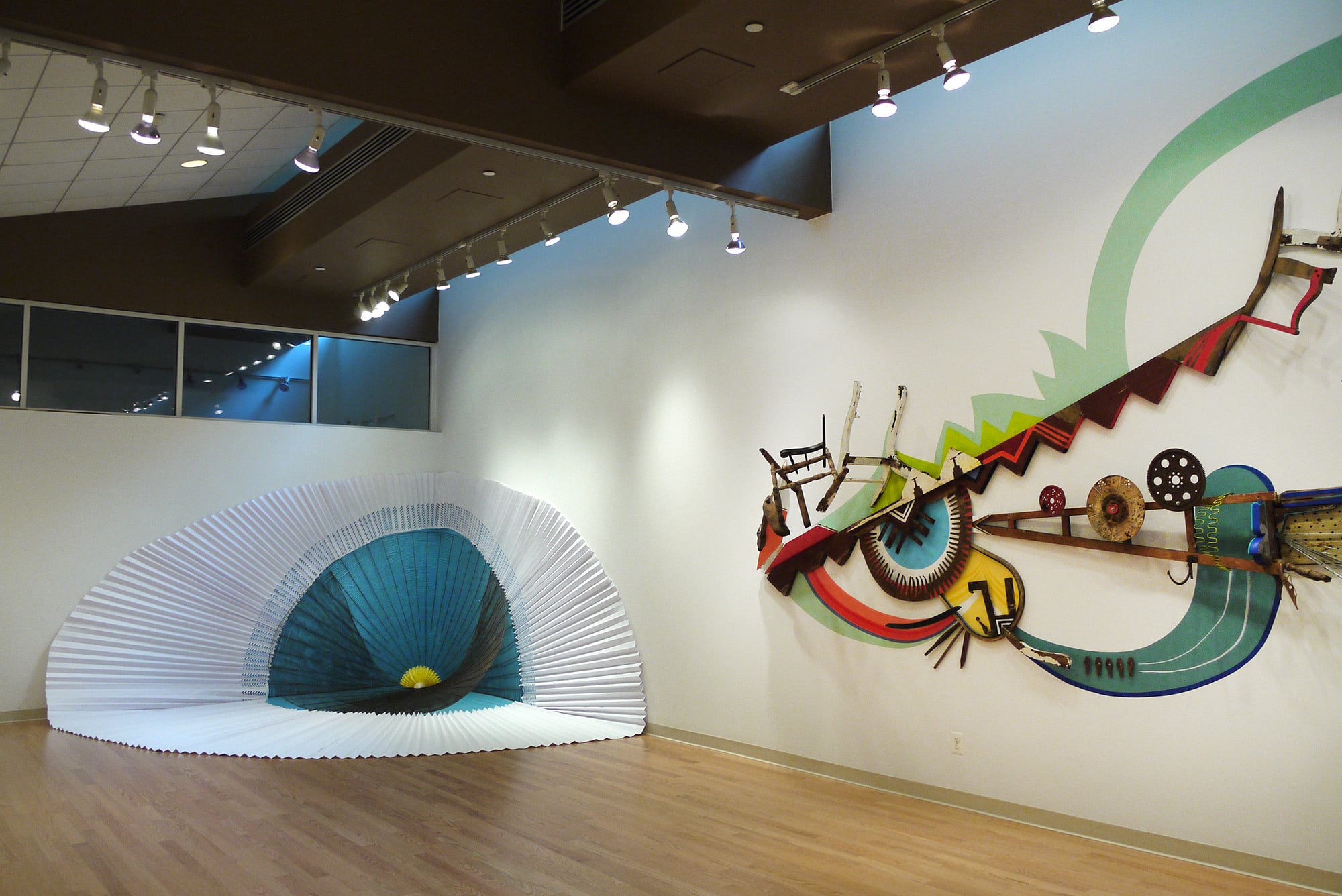 Resplandor and La Mudanza installations in the solo exhibit Intervenida by Emily C-D at Julio Fine Arts Gallery at Loyola University, Baltimore, MD, 2012.