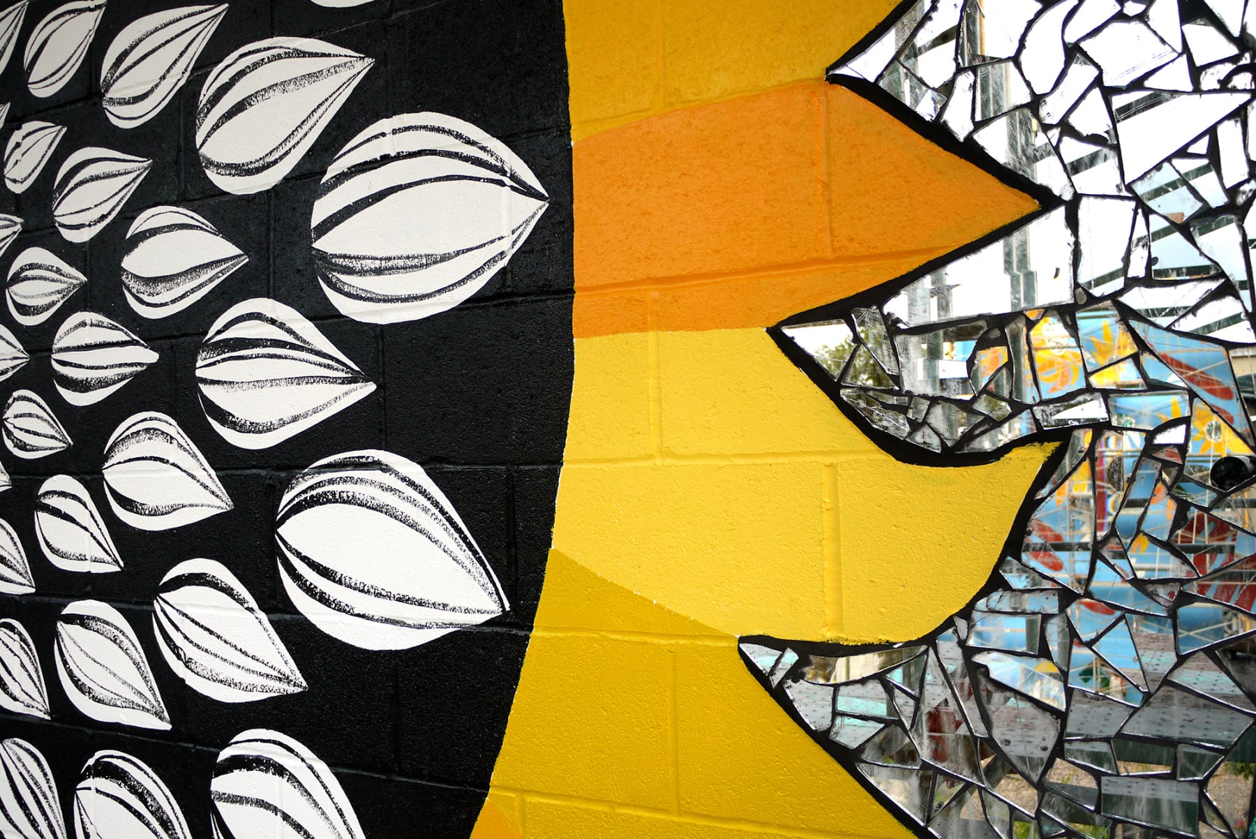 Sunflower Village garden mural diptych in Baltimore, MD by Emily C-D with Jessie and Katey (artist trio Can Collective), 2012.